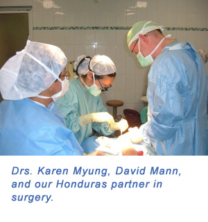 Dr's Karen Myung, David Mann, and our Honduras partner in surgery.